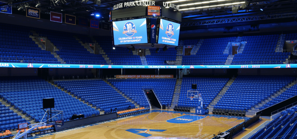 Indoor arena with blue seats
