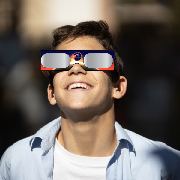 Boy and TEDFW Glasses 2 Boy with Solar eclipse glasses on